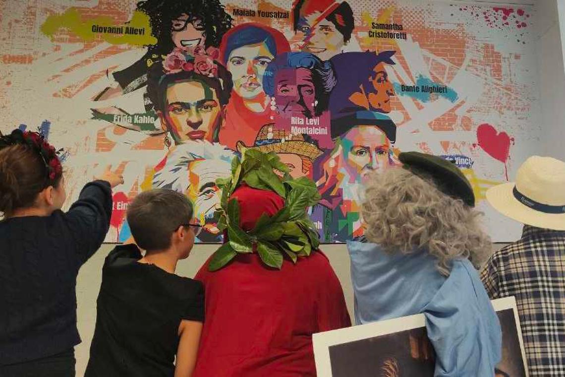 Cosa ci fanno Dante, Leonardo e Rita Levi Montalcini sulla parete? La Scuola e le sue "meraviglie" 