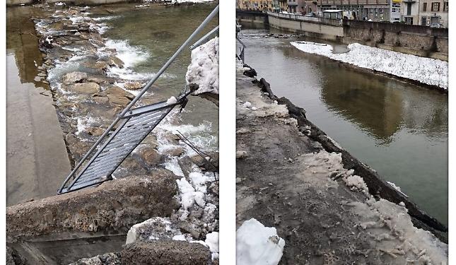 Crolla un tratto di marciapiede lungo il torrente: verifiche in corso
